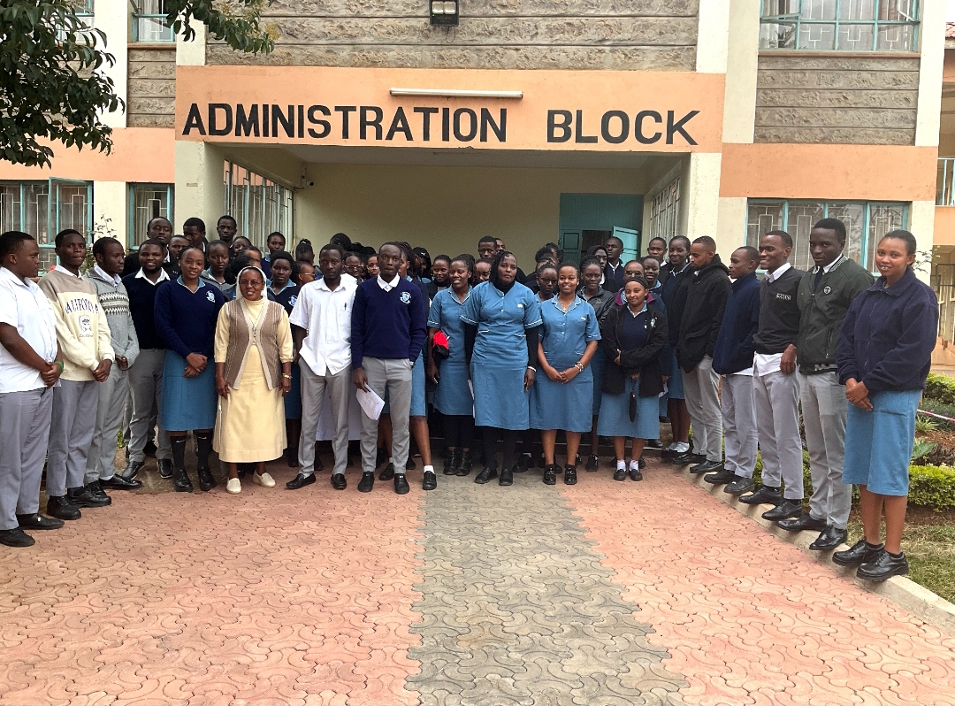 Students and staff gathered outside the Administration Block